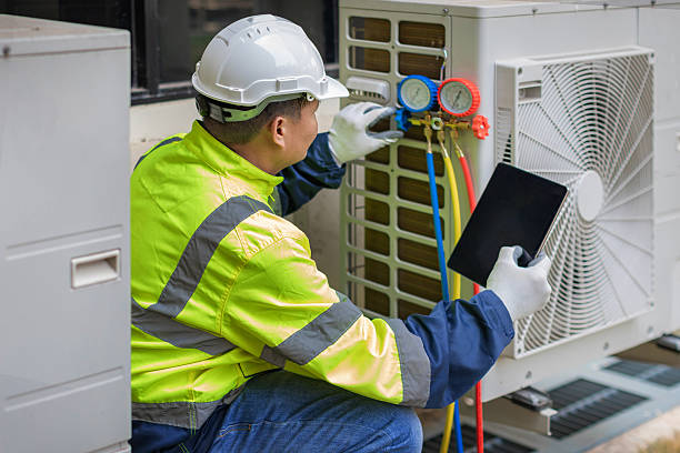 Professional Hvac technician working in Arlington, MA